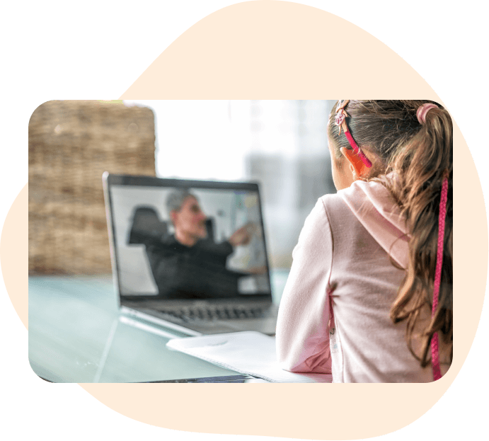 girl taking classes online on a tablet